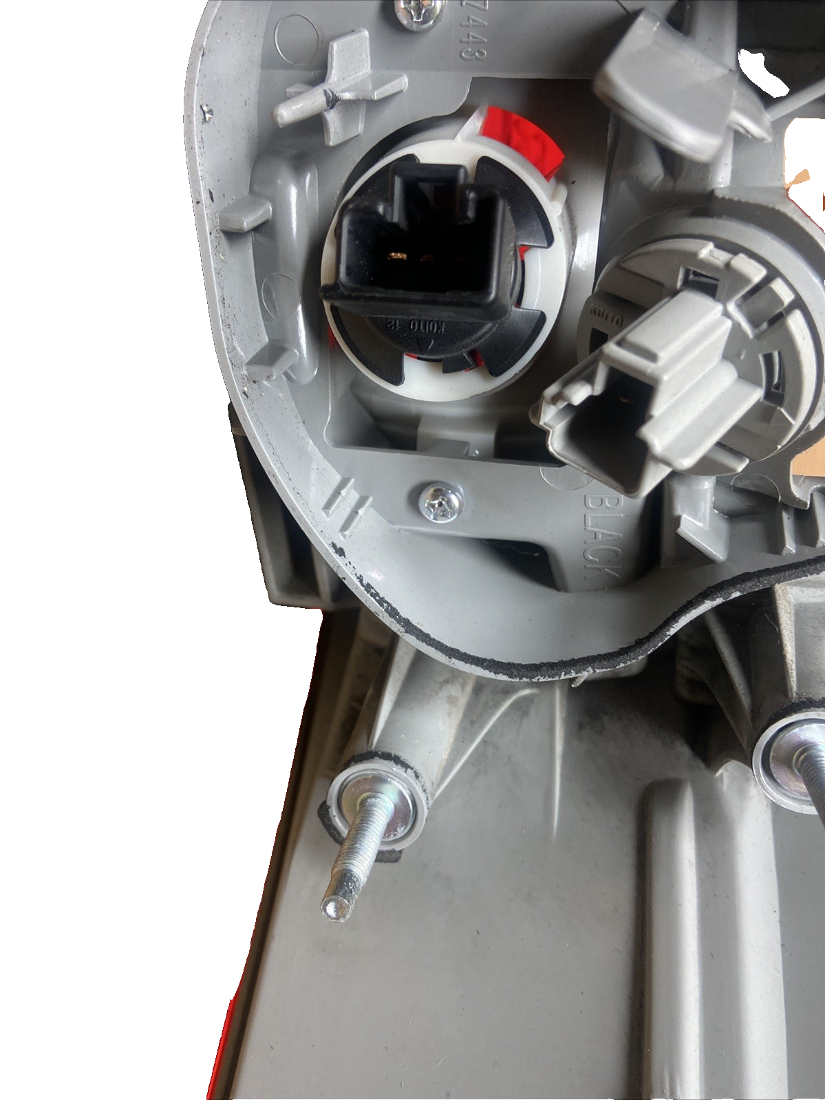 Conjunto de luces traseras exteriores izquierdas del lado del conductor de un Toyota Camry 2008