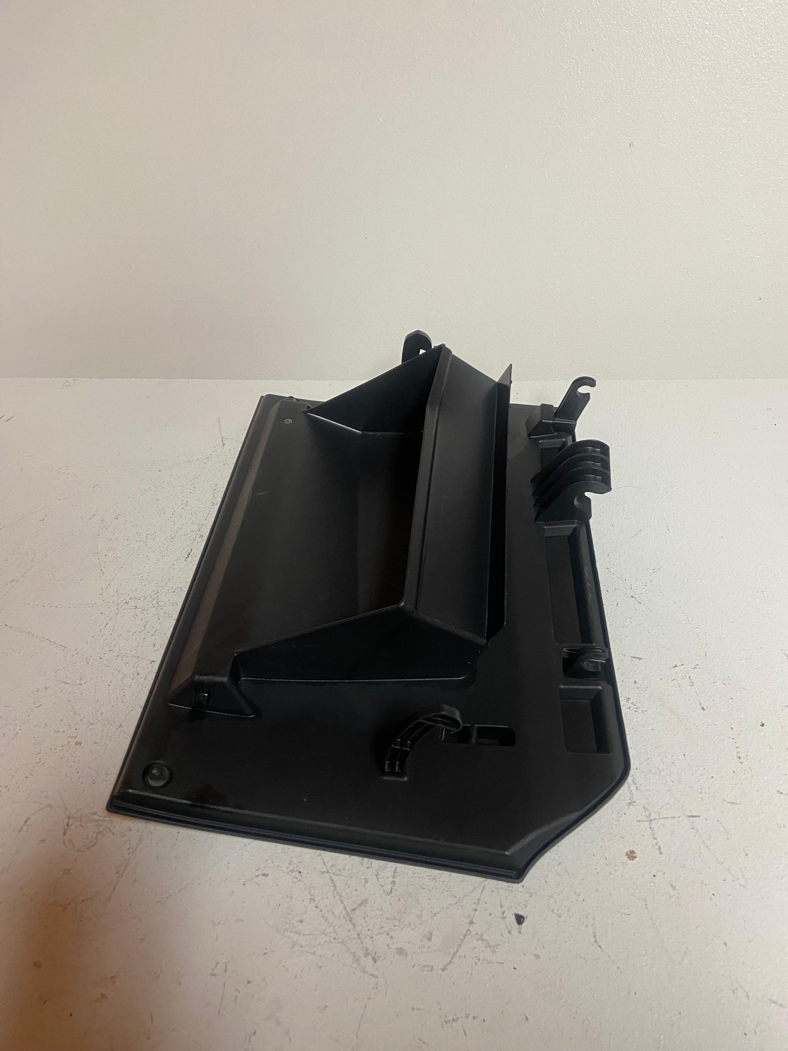 Black glove box lid interior tray with springs and mounting clips