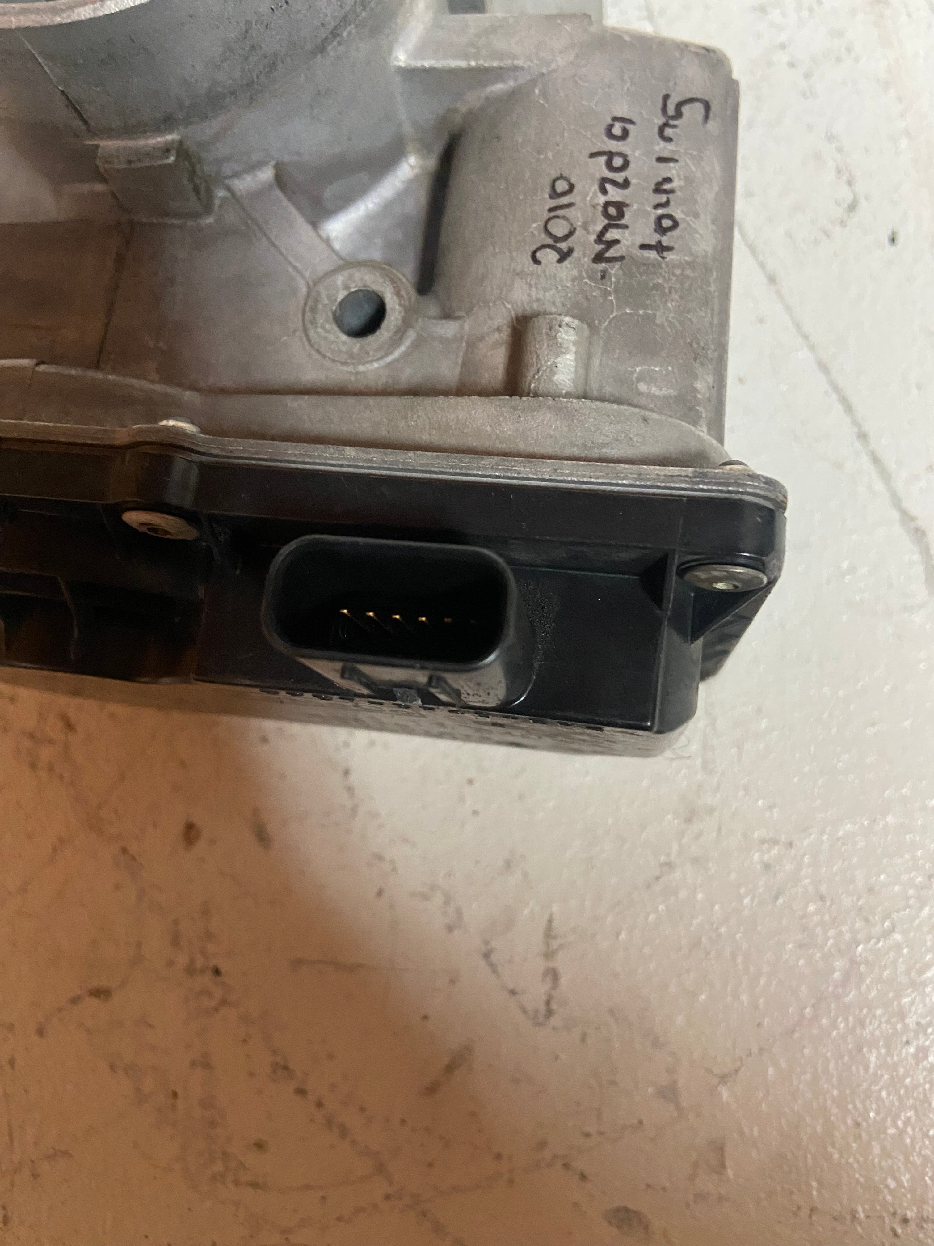 Throttle body electrical connector plug on black sensor module