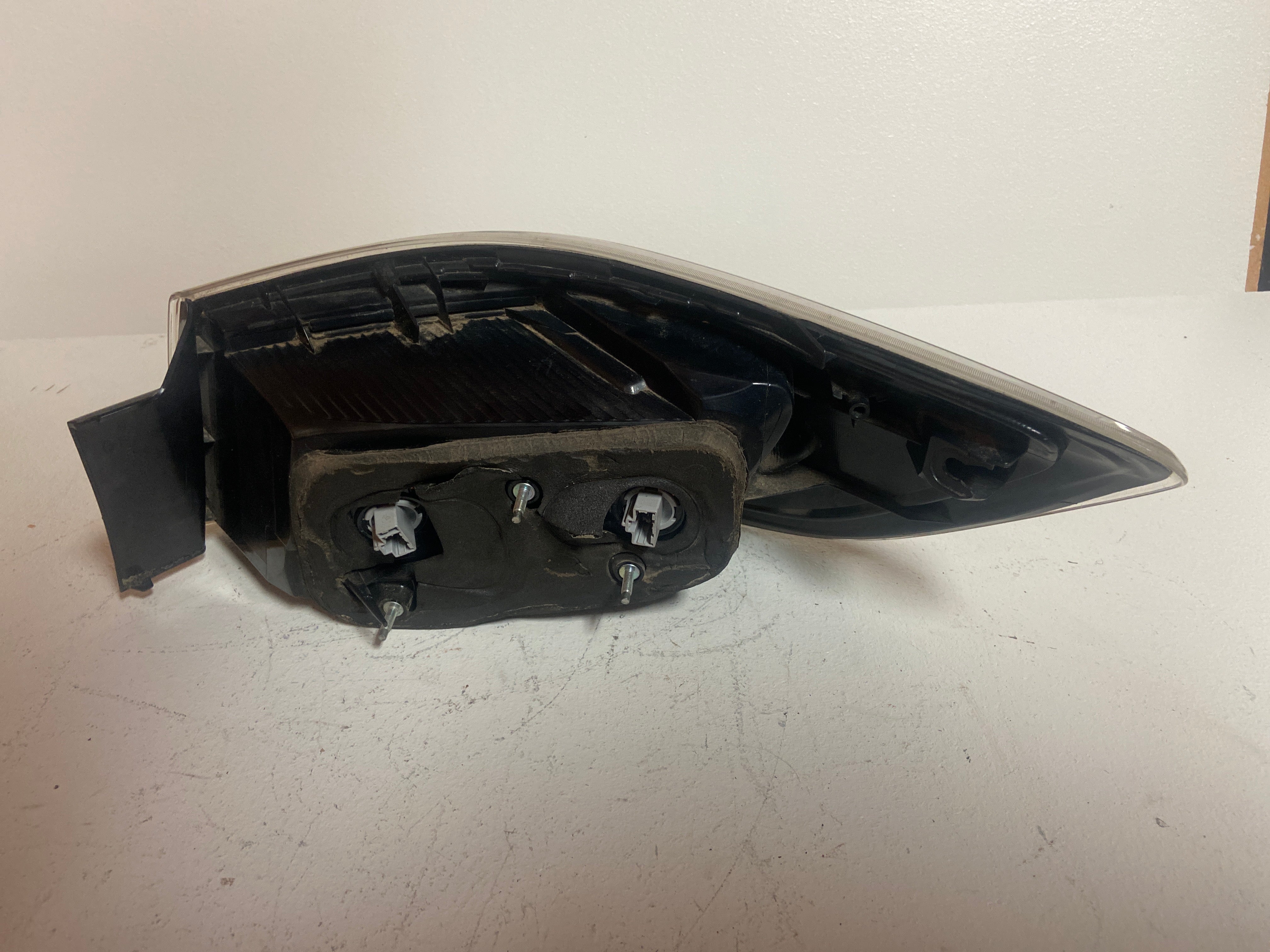 2011 Mazda touring 3 left driver taillight