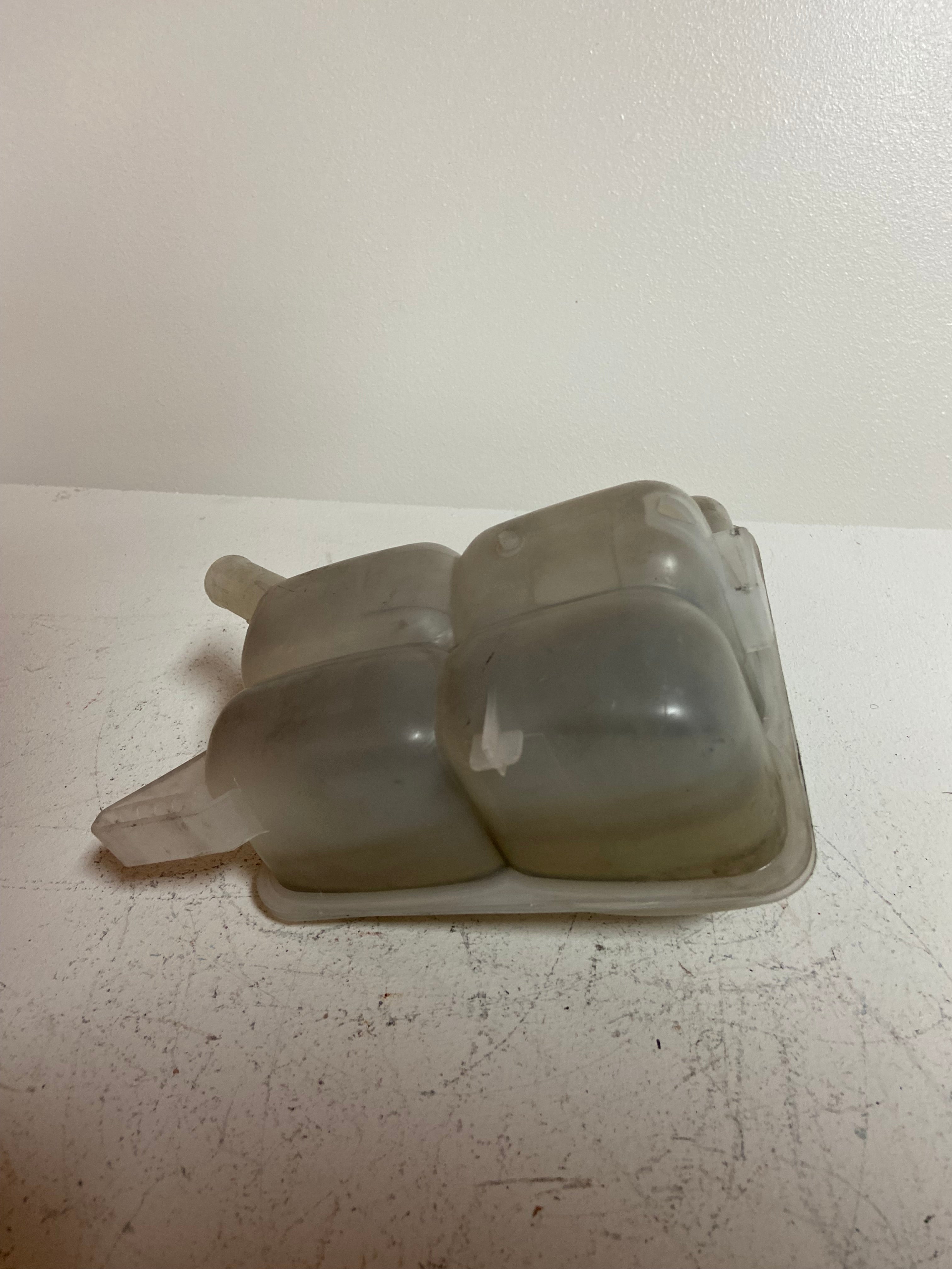 Engine coolant reservoir tank, light gray plastic with side outlet tube