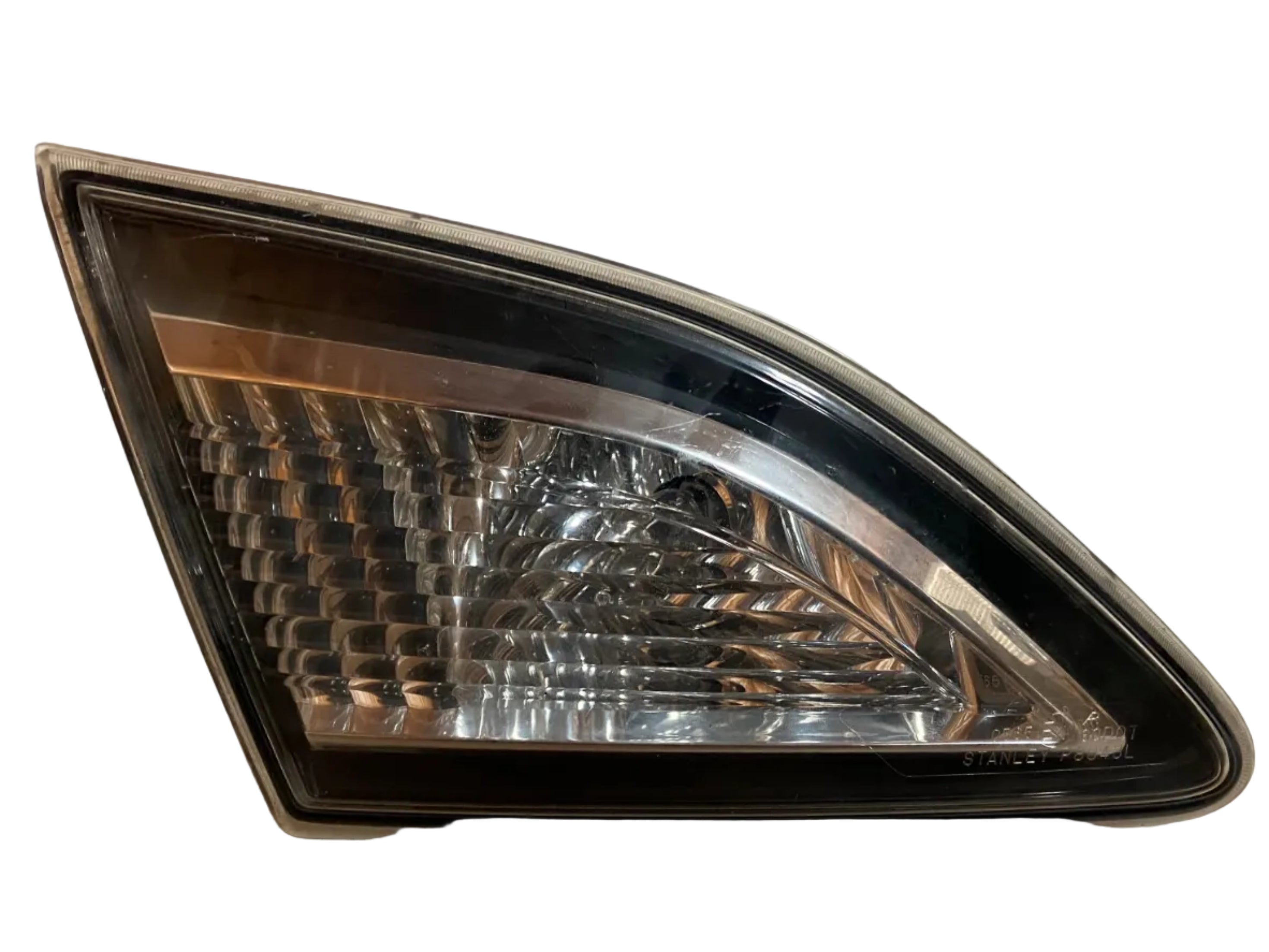 Left rear inner tail light/reverse lamp assembly, clear reflector lens with chrome facets