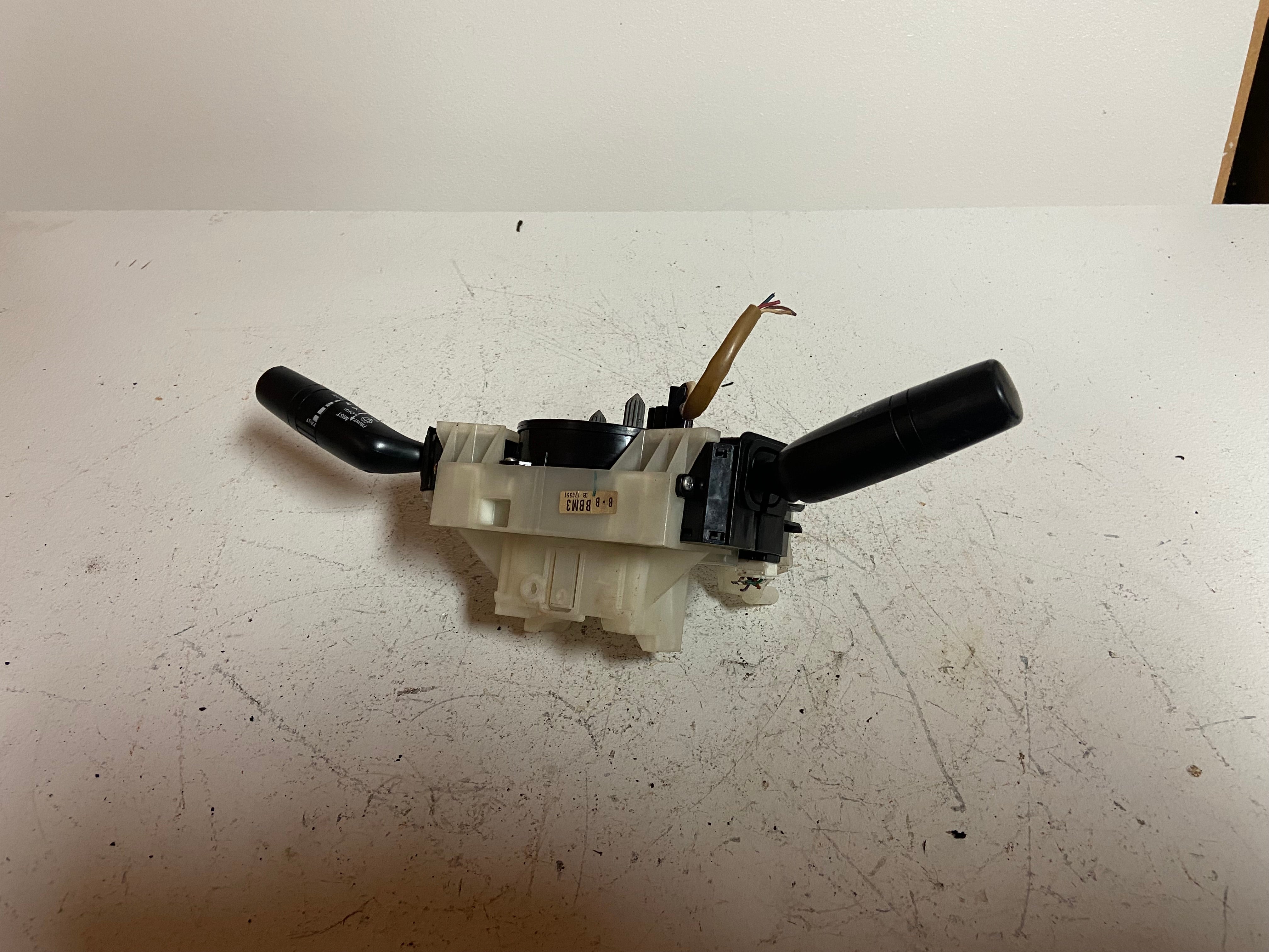Steering column switch assembly with two black stalks and wiring harness
