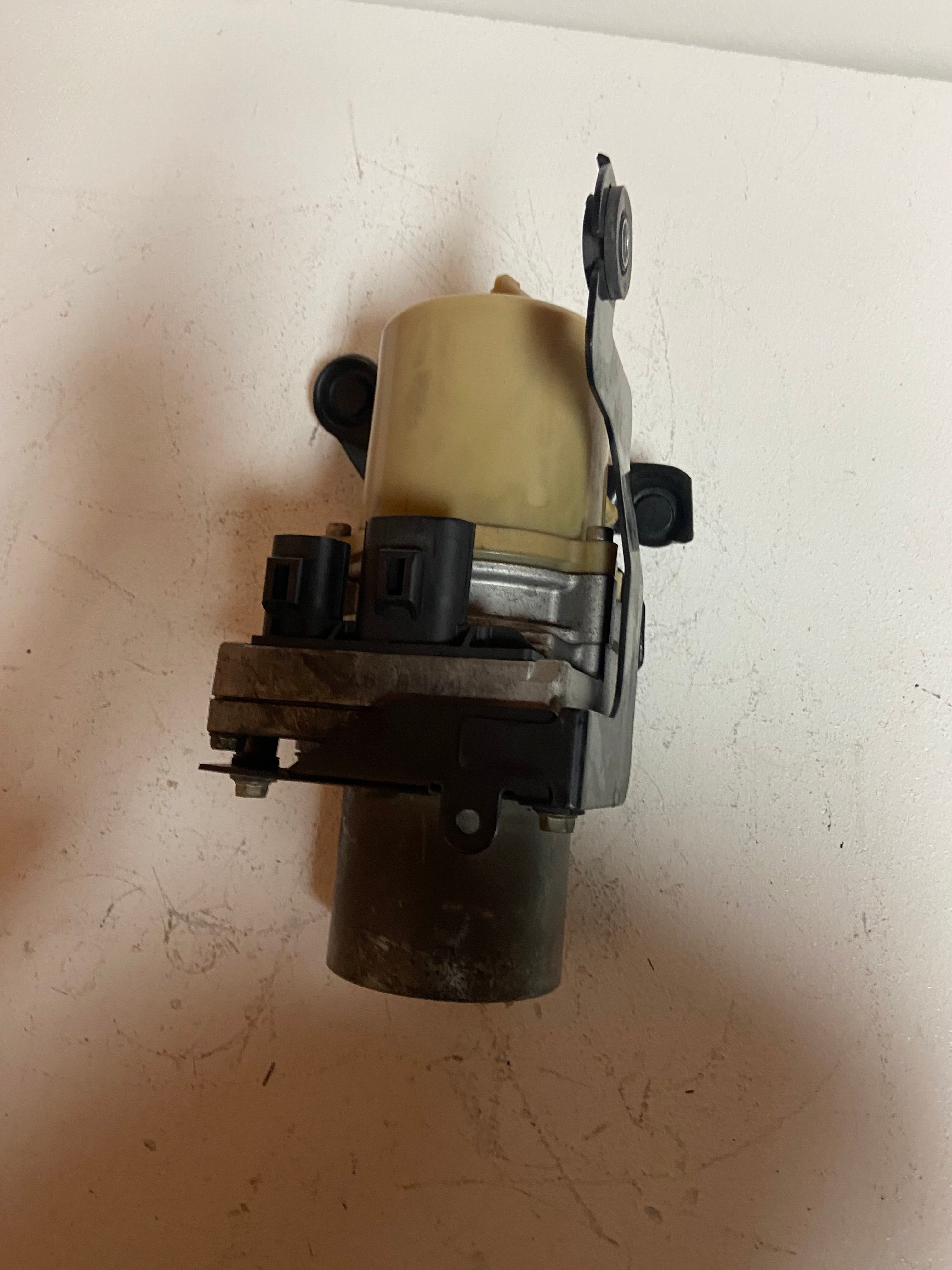 Power steering pump motor assembly with black control module and connectors