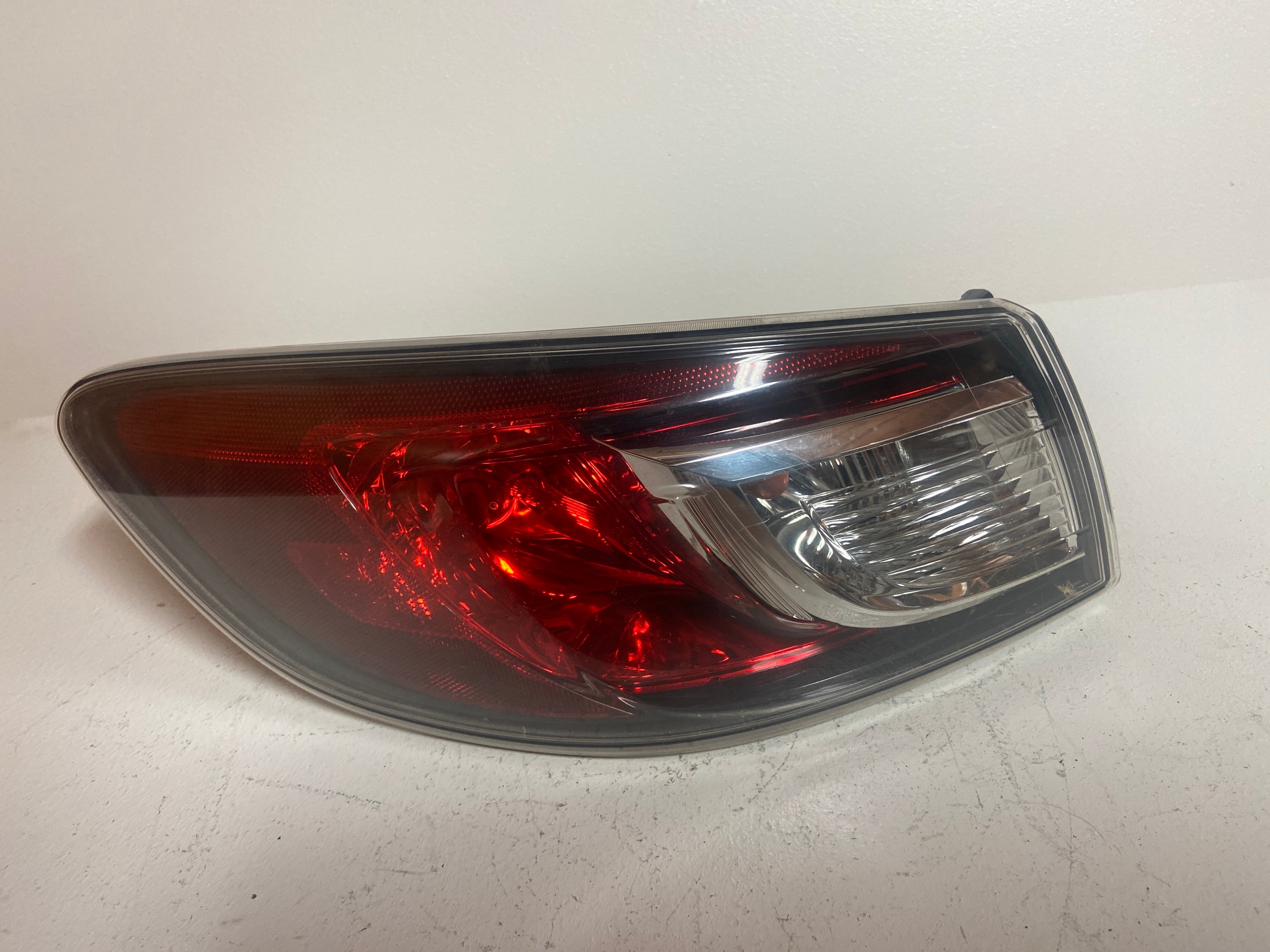 2011 Mazda touring 3 left driver taillight