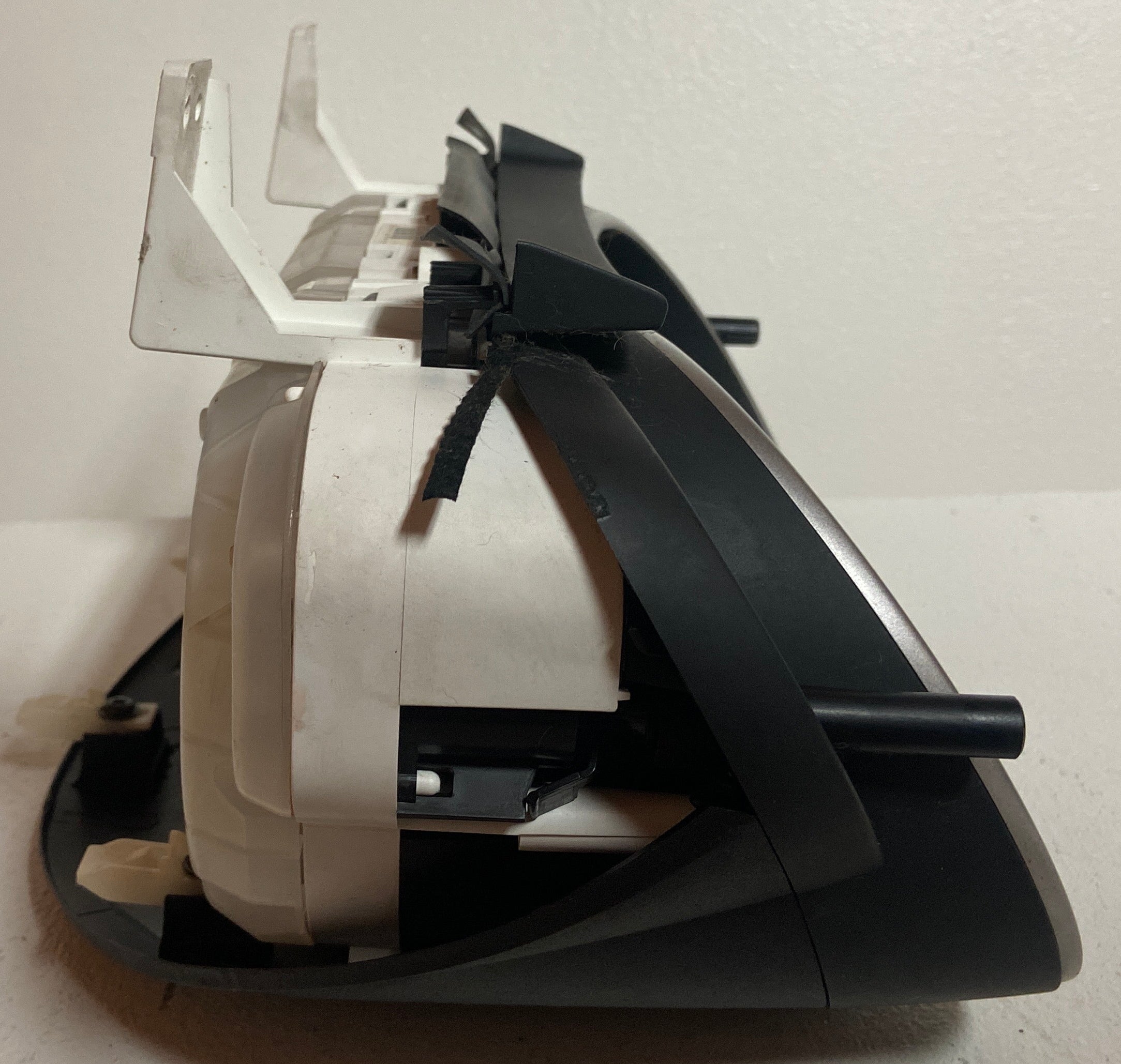 Vehicle instrument cluster housing assembly with wiring and mounting hardware