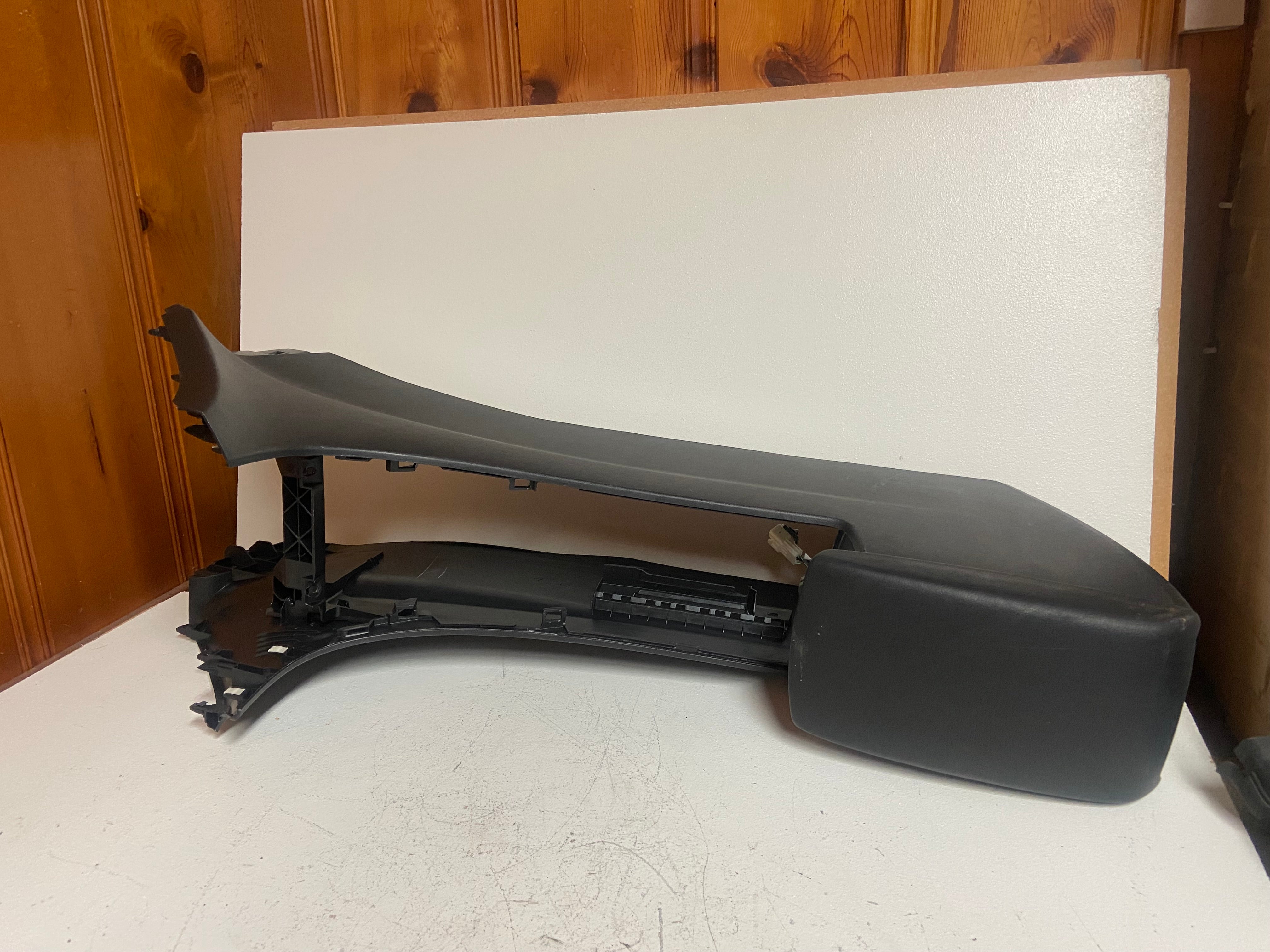Black floor console upper cover with open access openings